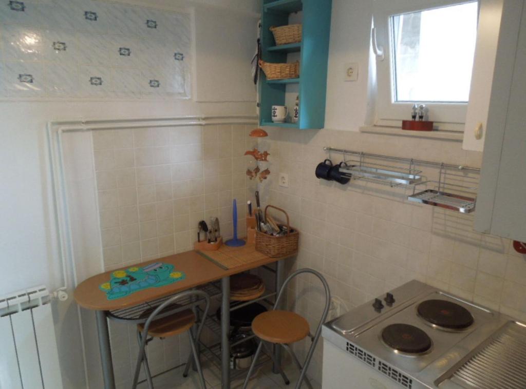 Kuchyň nebo kuchyňský kout v ubytování Apartments Julia