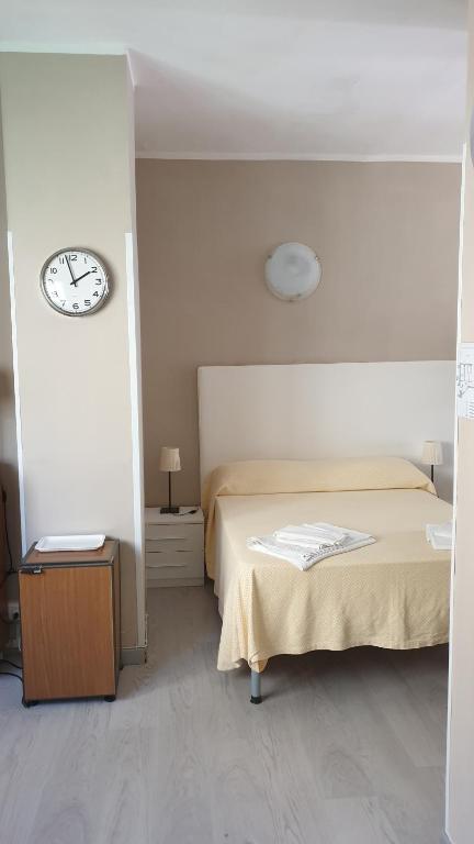 Кровать или кровати в номере Piccolo hotel holiday center