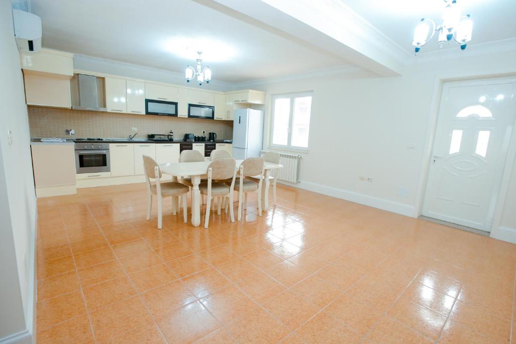 Kuchyň nebo kuchyňský kout v ubytování Urban Escape Guesthouse