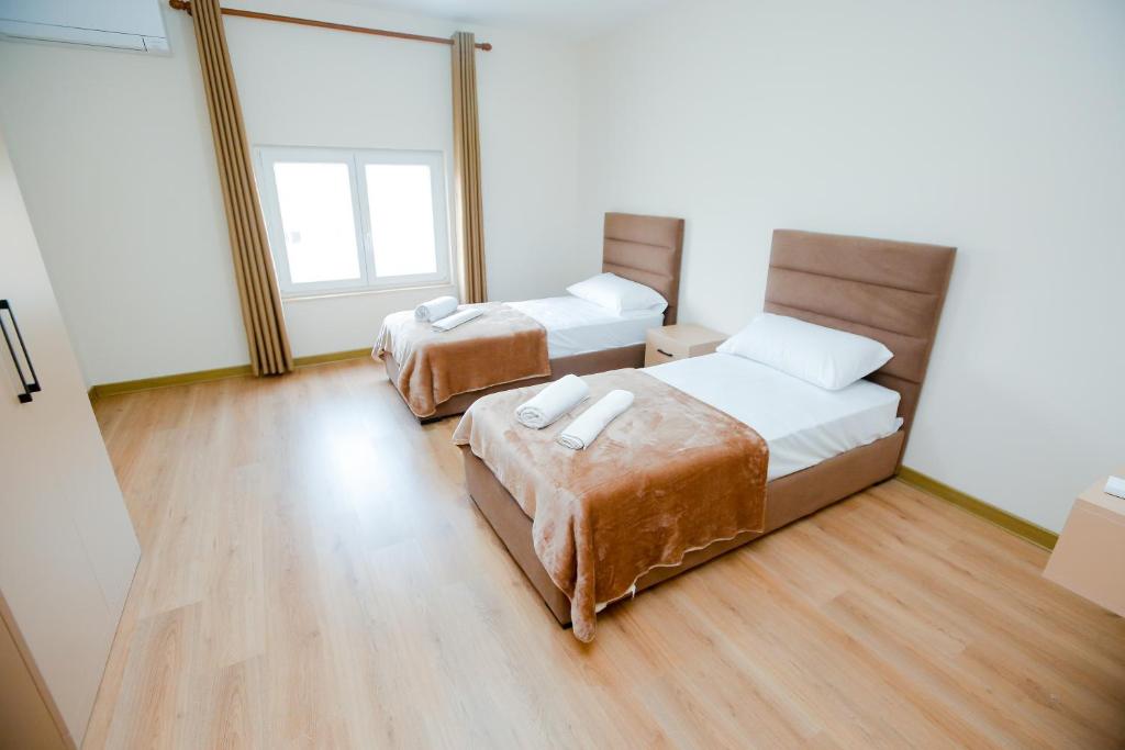 Postel nebo postele na pokoji v ubytování Urban Escape Guesthouse