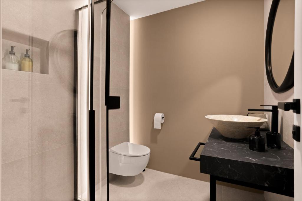Koupelna v ubytování Hotel Harmonija SPA & FREE PARKING