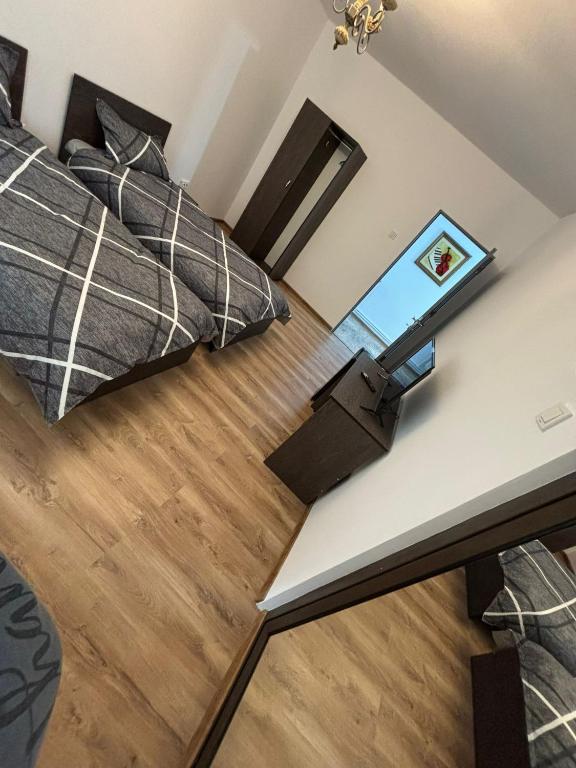 Postel nebo postele na pokoji v ubytování Alexander Residence