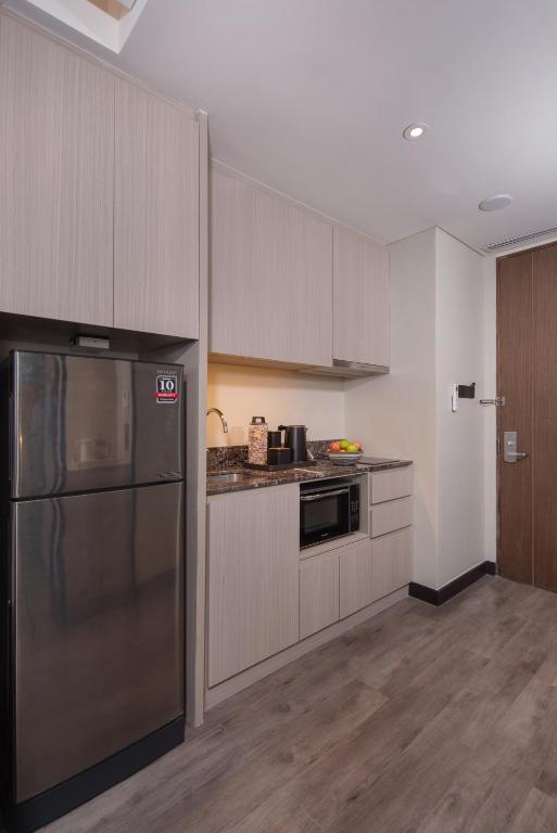 Kuchyň nebo kuchyňský kout v ubytování Citadines Bacolod City