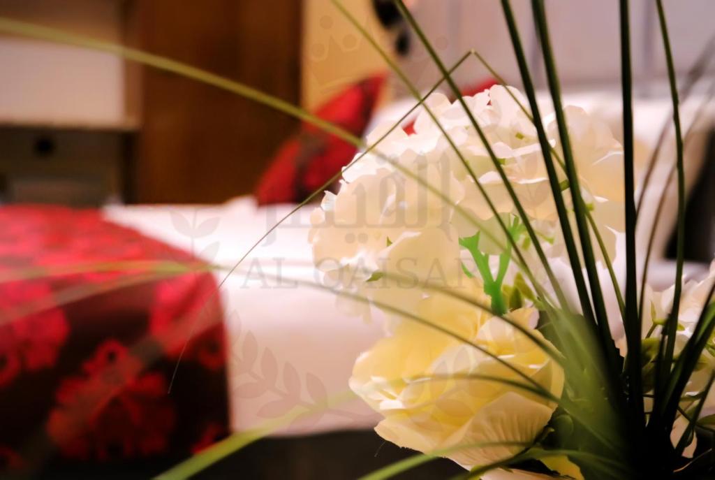 Postel nebo postele na pokoji v ubytování Hôtel AL QAISAR