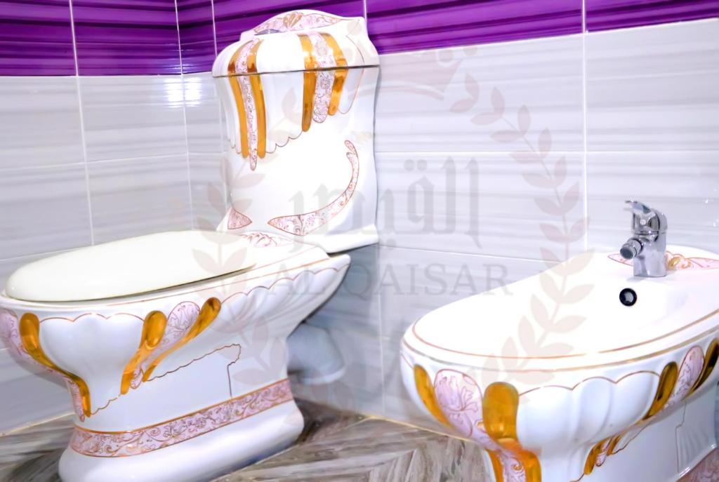 Koupelna v ubytování Hôtel AL QAISAR