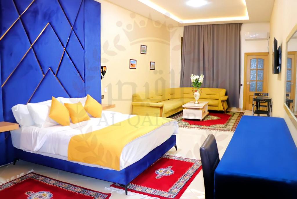 Postel nebo postele na pokoji v ubytování Hôtel AL QAISAR