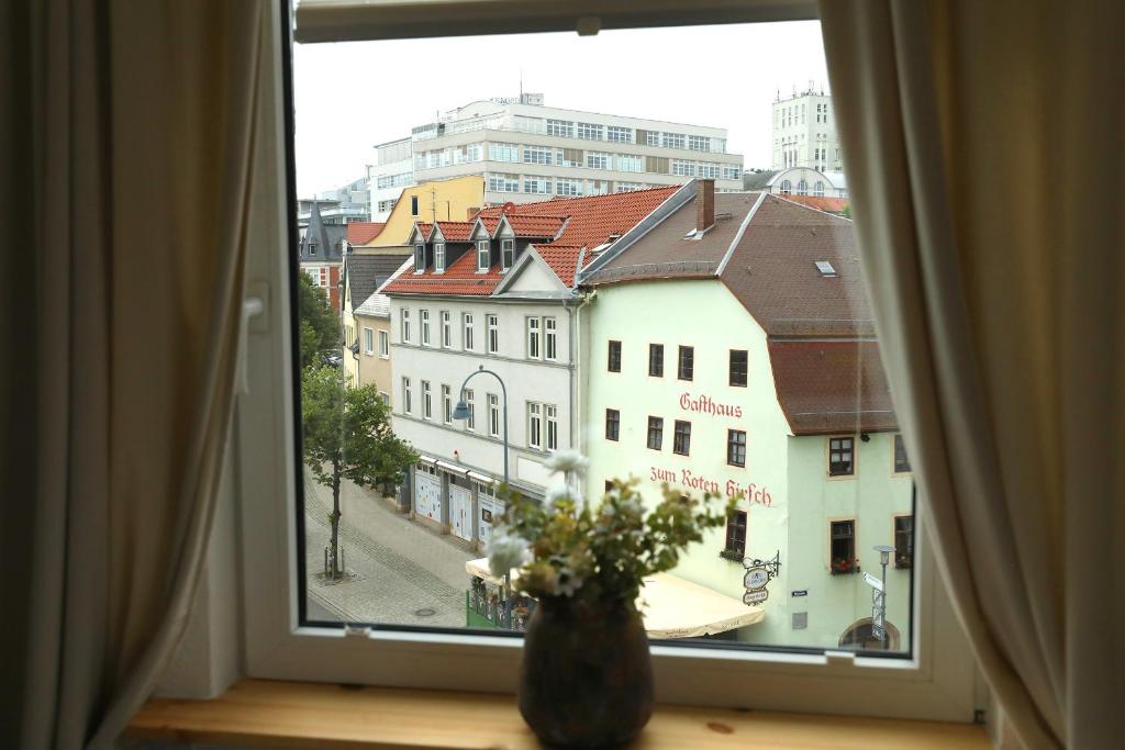 Nespecifikovaný výhled na destinaci Jena nebo výhled na město při pohledu z penzionu