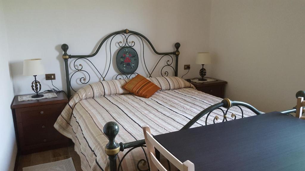 Postel nebo postele na pokoji v ubytování B&B Monteguzzo