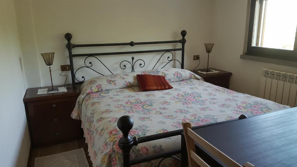 Postel nebo postele na pokoji v ubytování B&B Monteguzzo