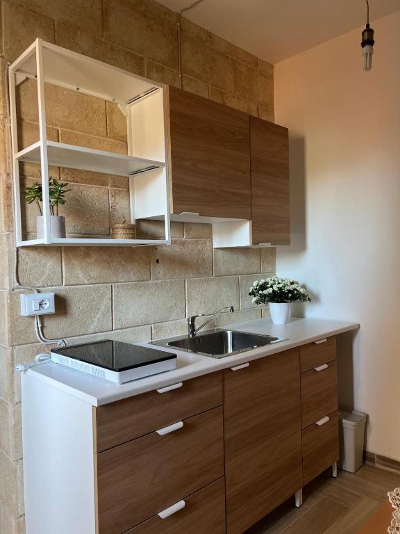 Kuchyň nebo kuchyňský kout v ubytování B&B Zio Cici