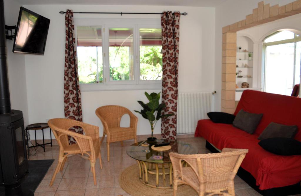 Posezení v ubytování Le Caprice de la mer - maison avec véranda, jardin