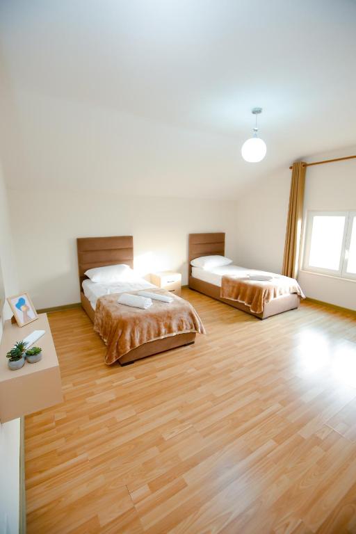 Postel nebo postele na pokoji v ubytování Urban Escape Guesthouse