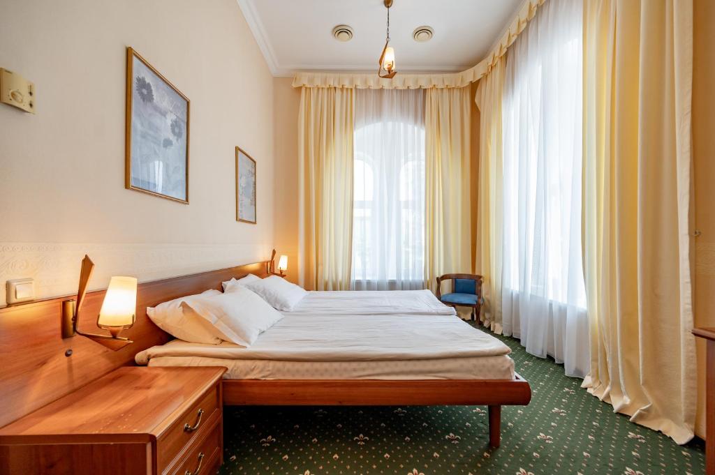 Postel nebo postele na pokoji v ubytování Морський