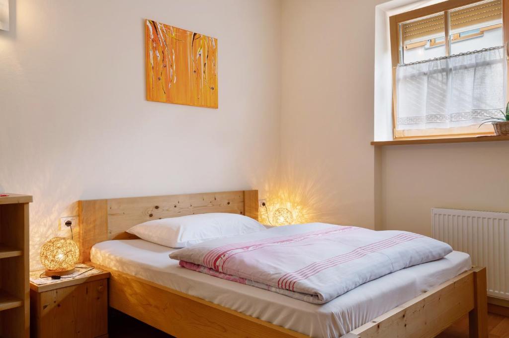 Postel nebo postele na pokoji v ubytování Friedheim Appartments