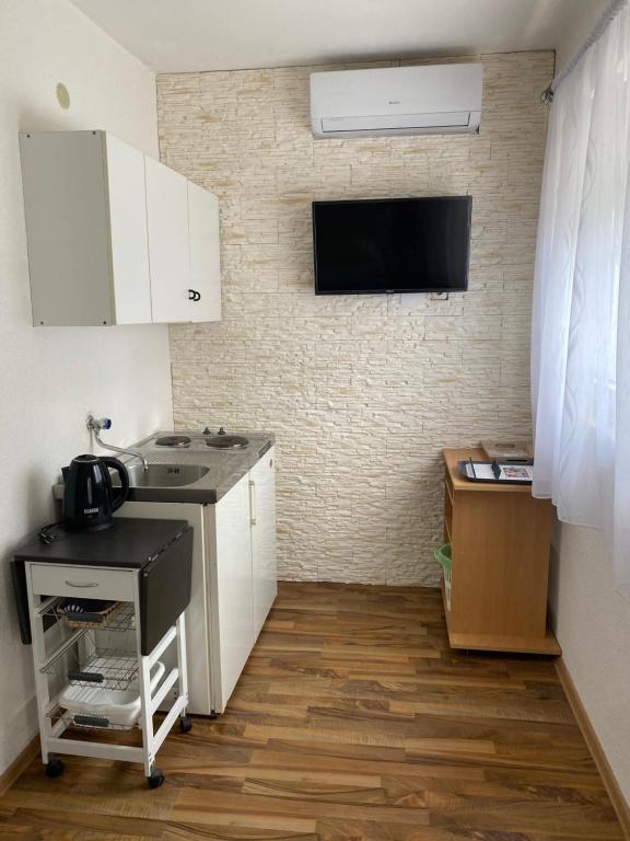 Kuchyň nebo kuchyňský kout v ubytování Villa Sekki