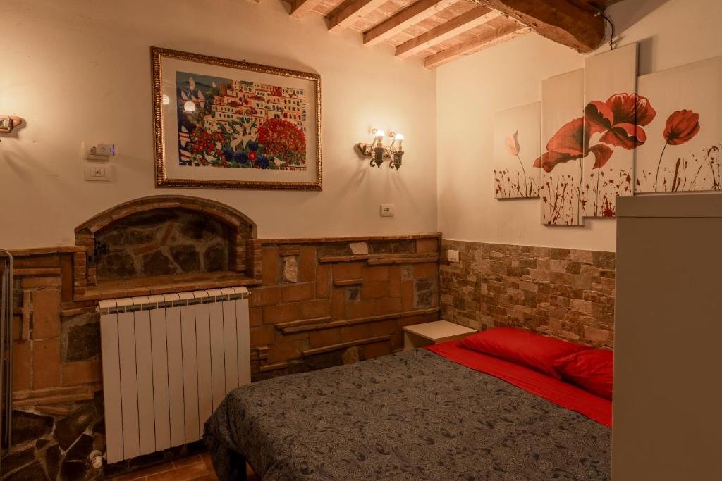 Posteľ alebo postele v izbe v ubytovaní Vacation Home Tuscany Pisa-Lucca Studio apartment