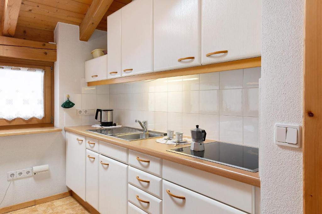 Kuchyň nebo kuchyňský kout v ubytování Friedheim Appartments