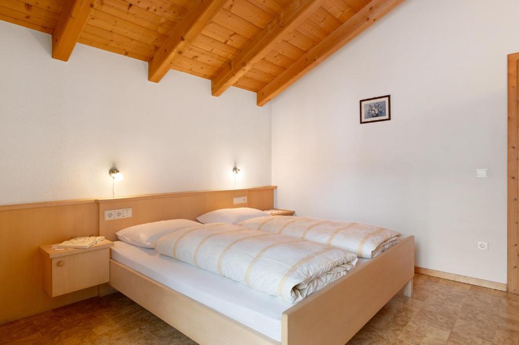 Postel nebo postele na pokoji v ubytování Friedheim Appartments