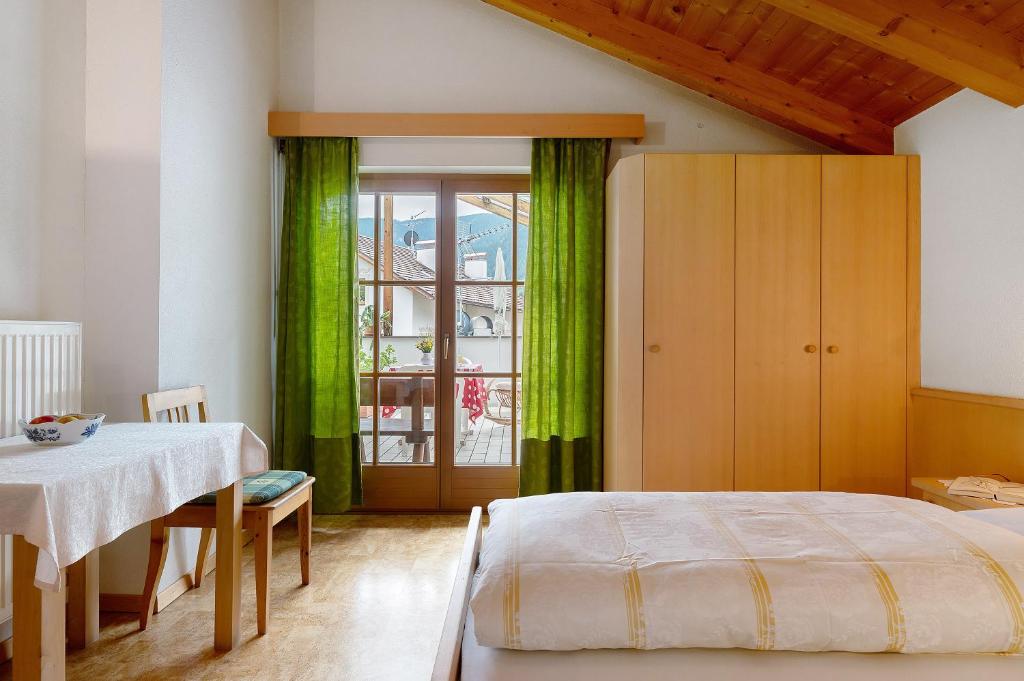 Postel nebo postele na pokoji v ubytování Friedheim Appartments