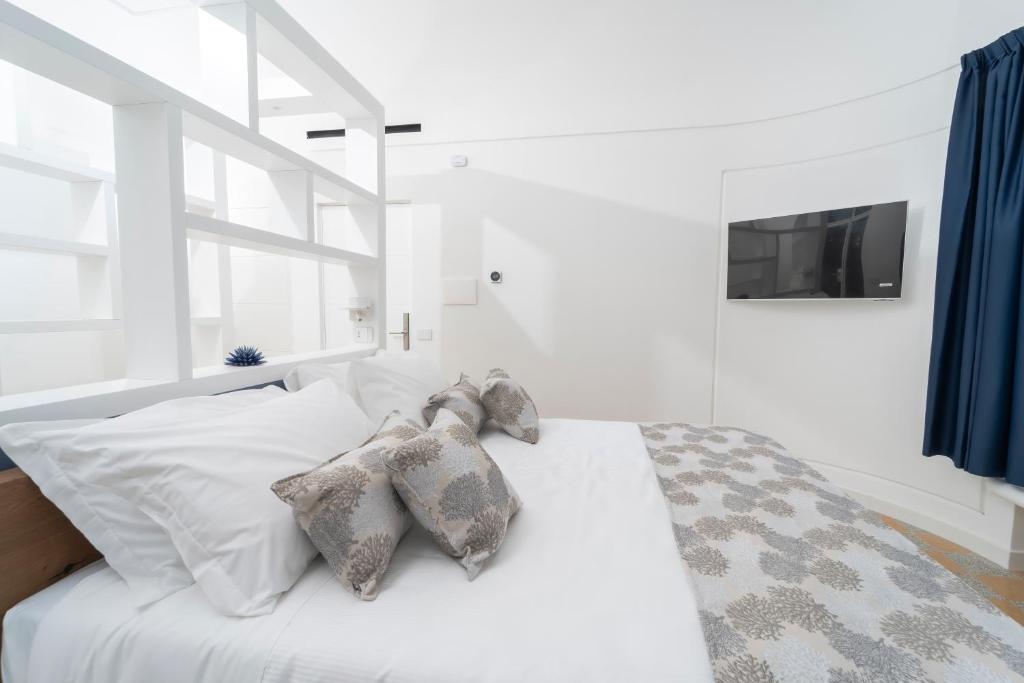 Postel nebo postele na pokoji v ubytování Villa L'Ara