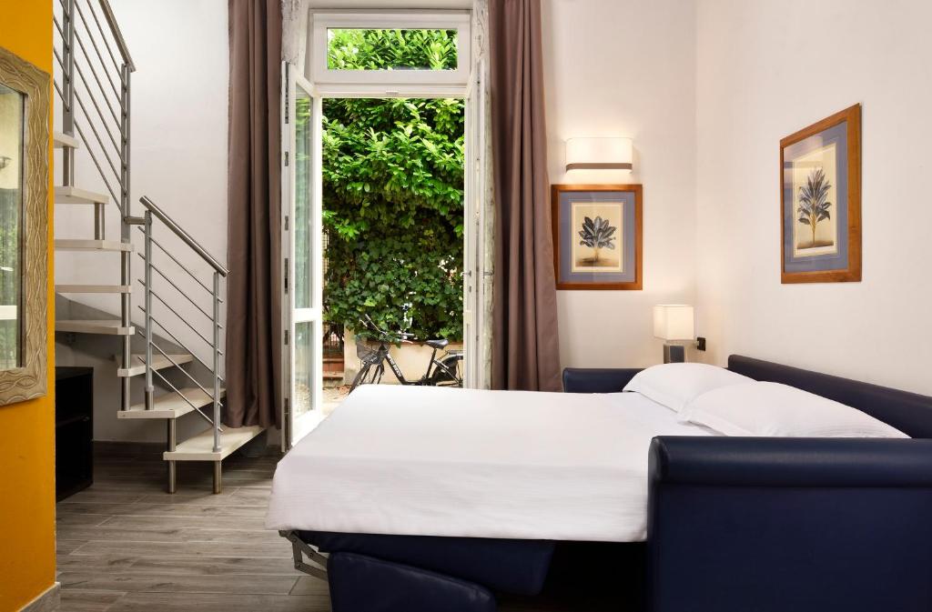 Katil atau katil-katil dalam bilik di FH55 Med Guesthouse