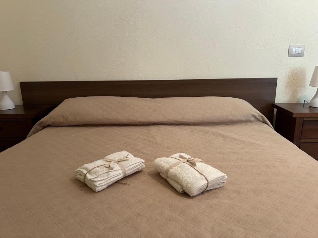 Postel nebo postele na pokoji v ubytování Palazzo 1815