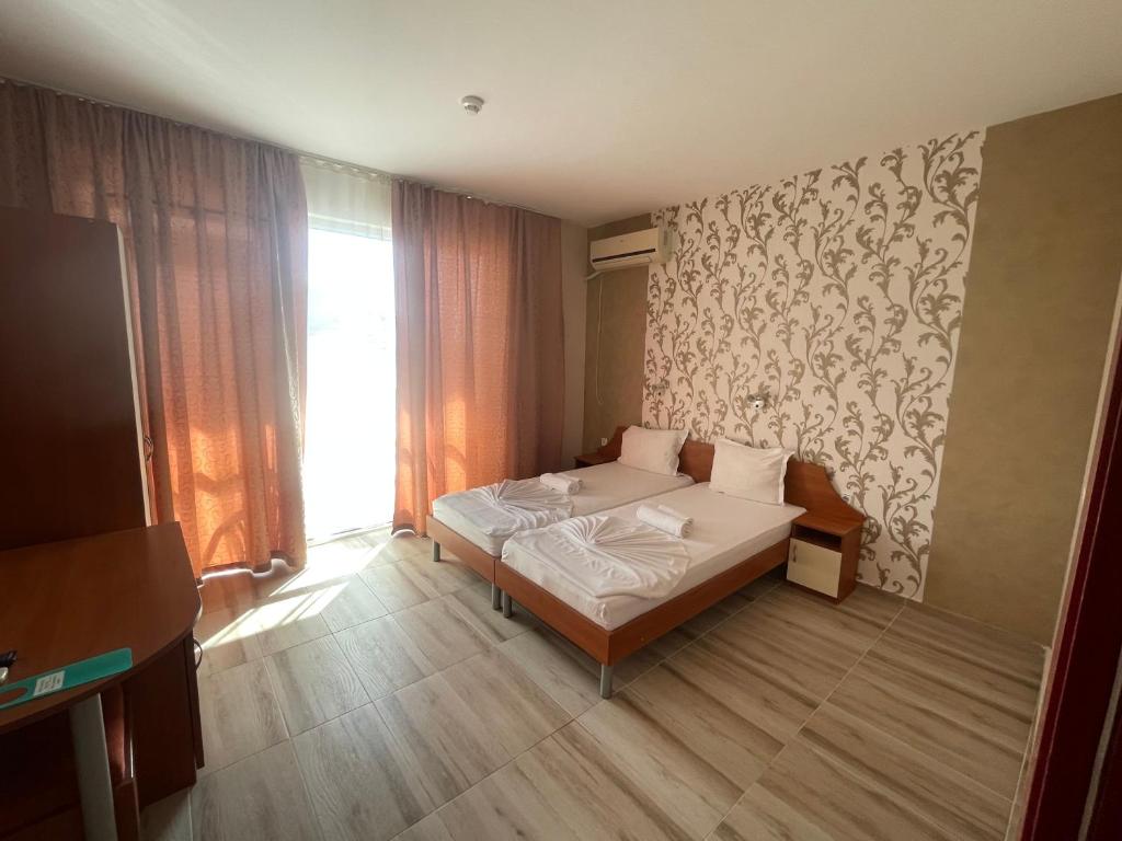 Postel nebo postele na pokoji v ubytování ,,Дироси''