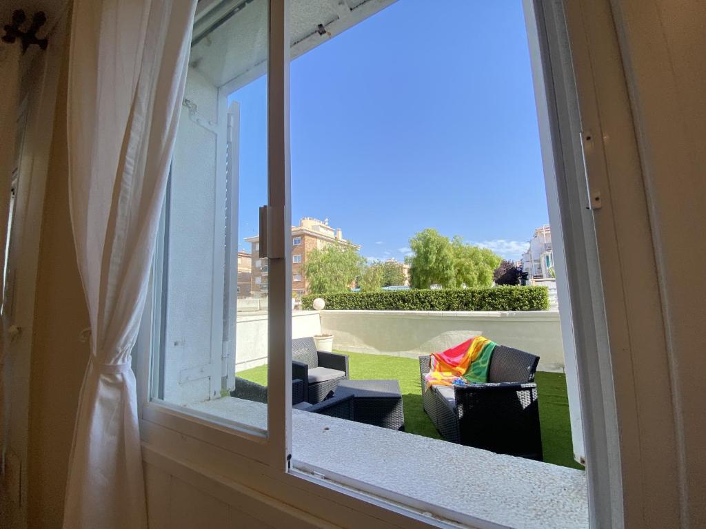 A balcony or terrace at R126 Beachfront Apartment Sant Salvador