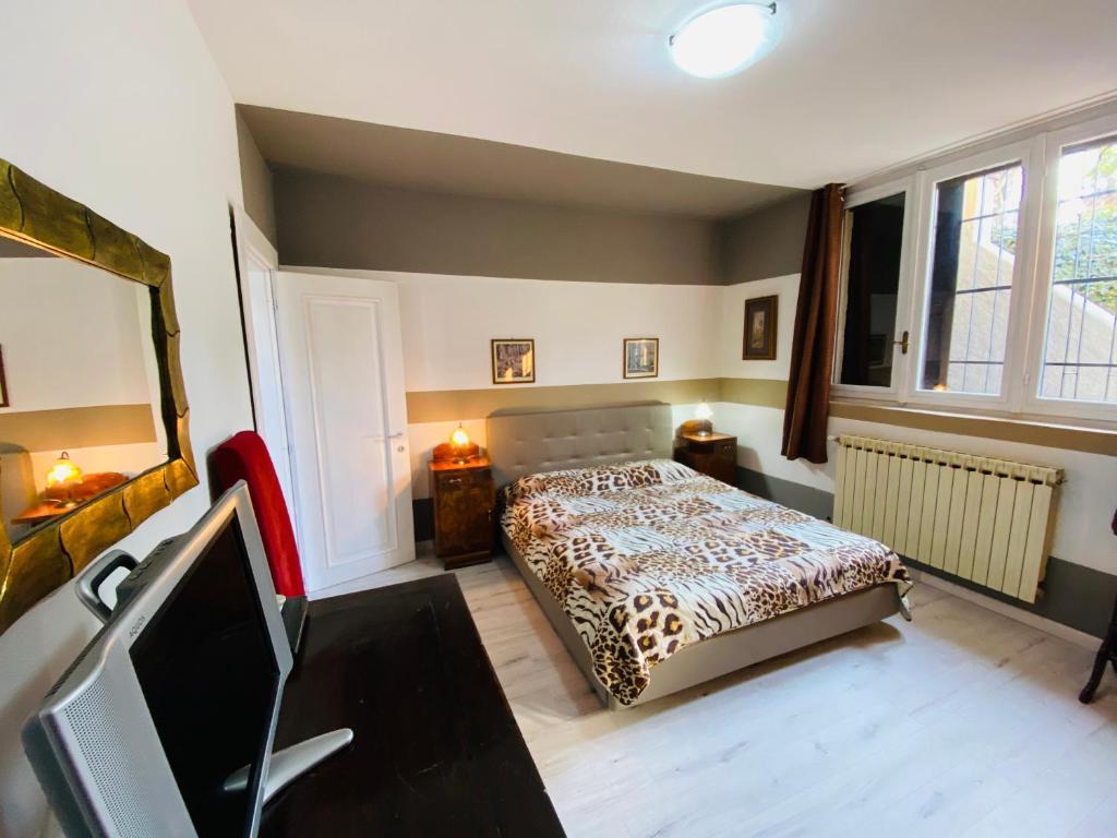 Postel nebo postele na pokoji v ubytování Flat with lake View e Garden