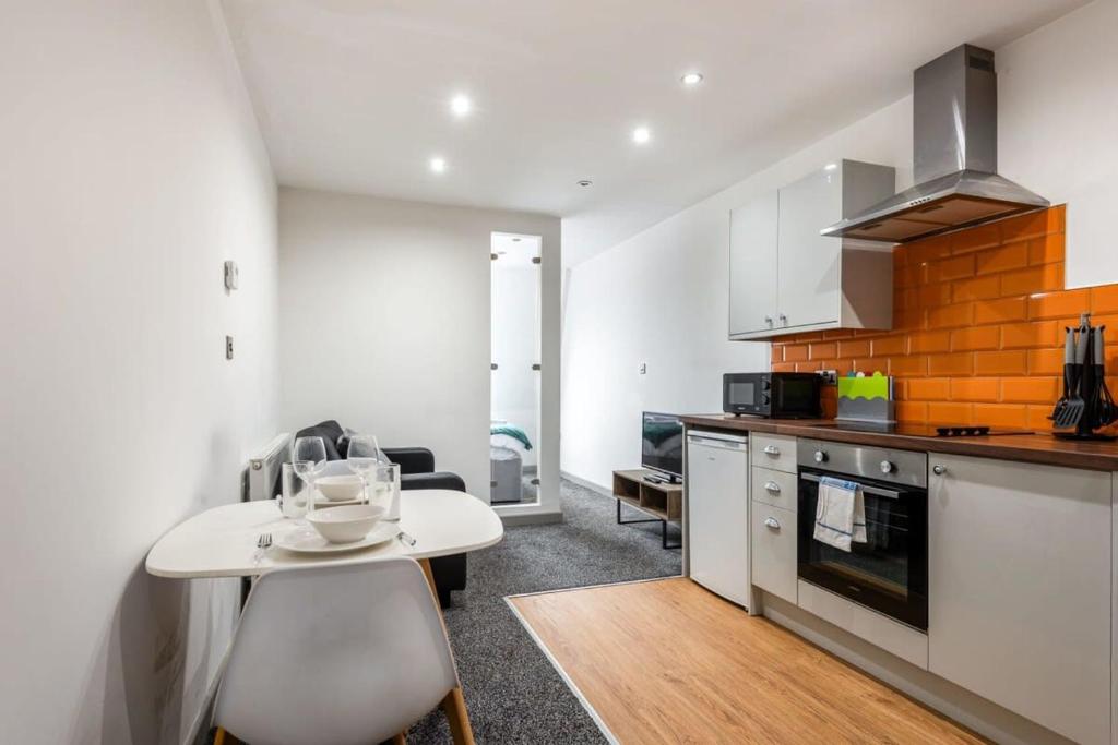Η κουζίνα ή μικρή κουζίνα στο Modern Budget 1 Bed Flat in Halifax Centre