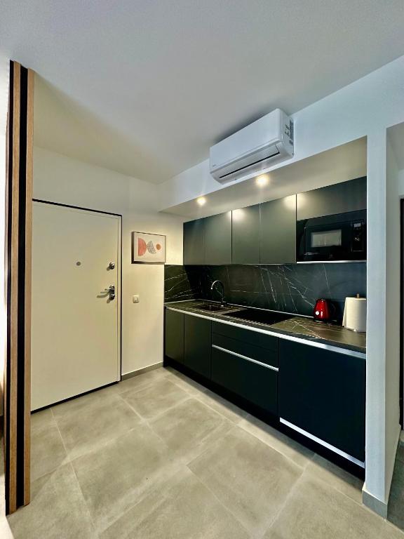 Kuchyň nebo kuchyňský kout v ubytování Apartment Sara IV