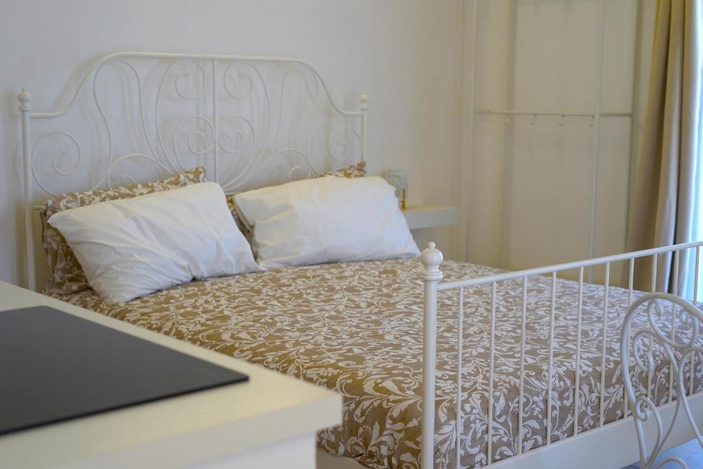 Postel nebo postele na pokoji v ubytování Masseria Fra Telesforo