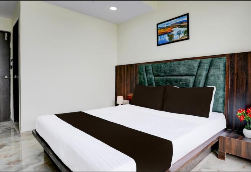 Postel nebo postele na pokoji v ubytování Hotel swagat inn bopal