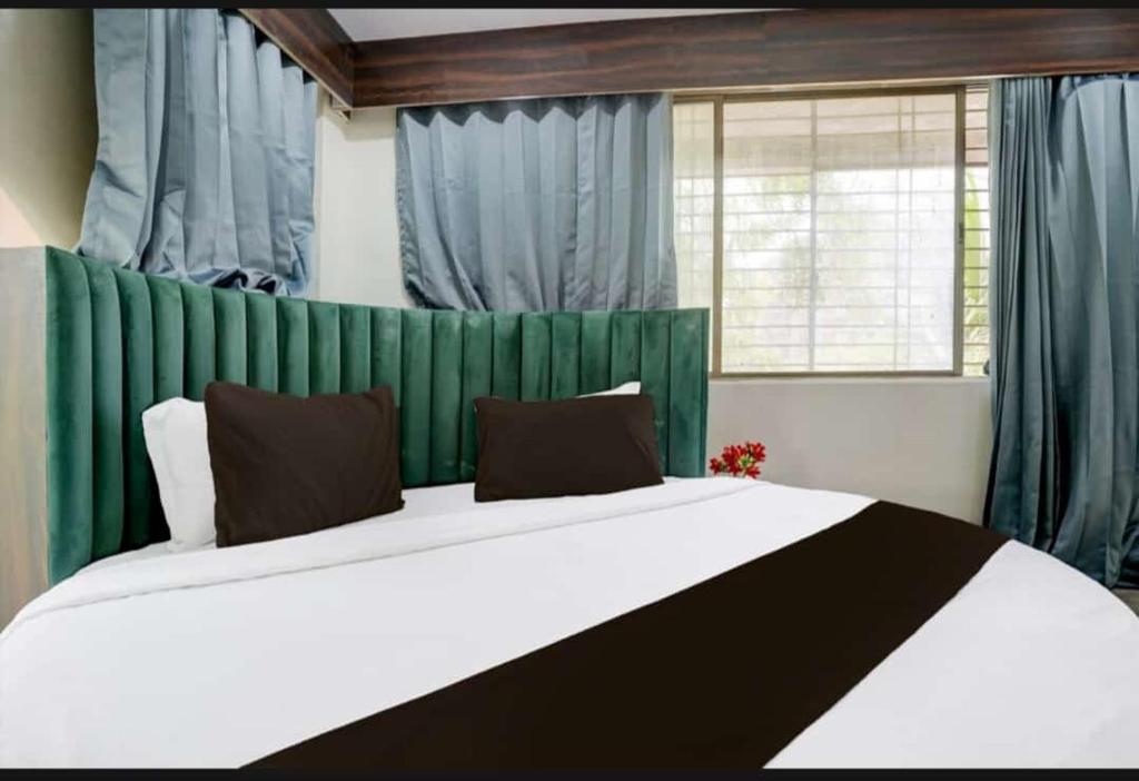 Postel nebo postele na pokoji v ubytování Hotel swagat inn bopal