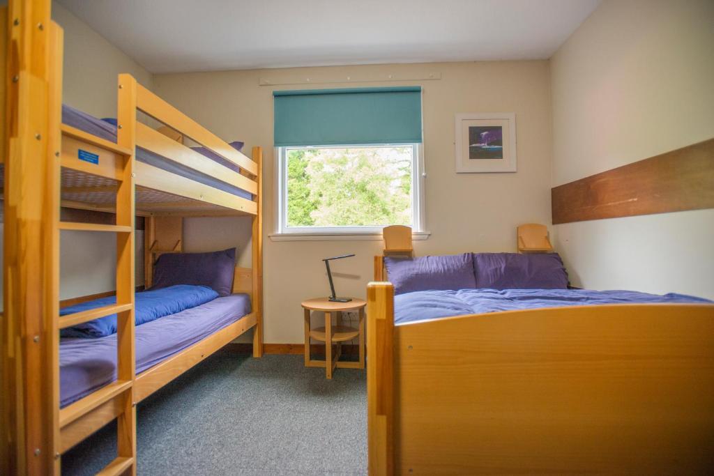 Postel nebo postele na pokoji v ubytování Crianlarich Youth Hostel