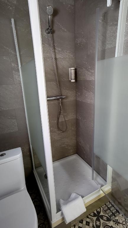 Koupelna v ubytování Hotel Le Colibri