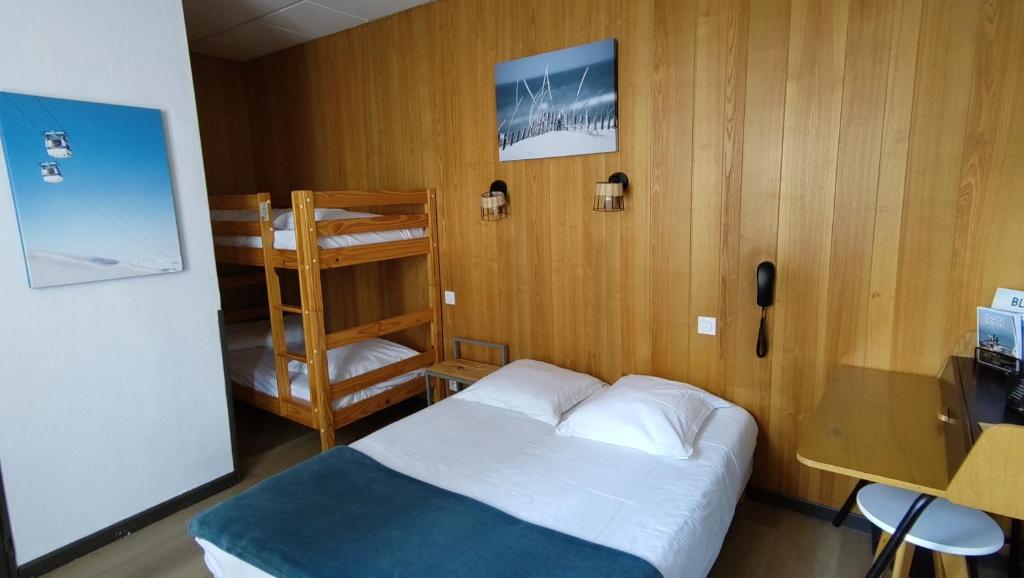 Postel nebo postele na pokoji v ubytování Hotel Le Colibri