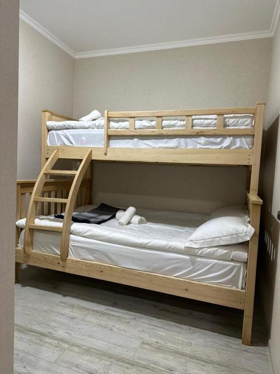 Postel nebo postele na pokoji v ubytování Cottage V1