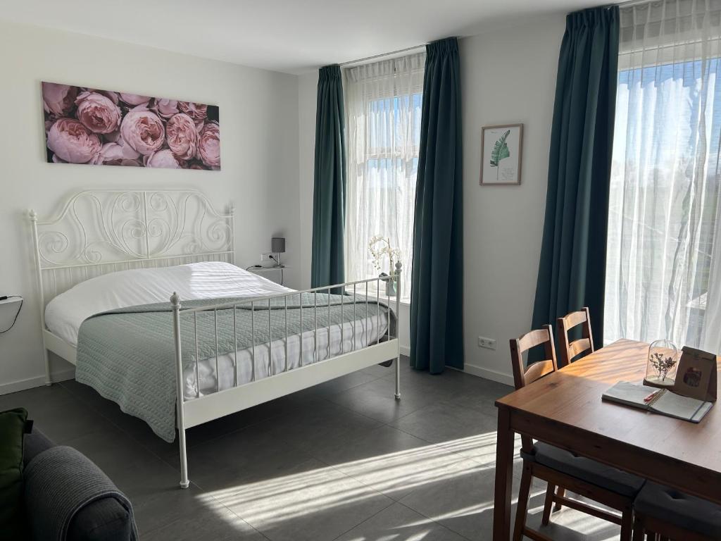 Postel nebo postele na pokoji v ubytování B&B Zunderdorp