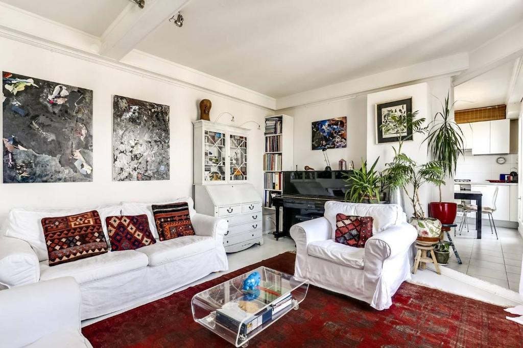 Photo de la galerie de l'établissement GuestReady - French Flair Rooftop Hideaway, à Paris