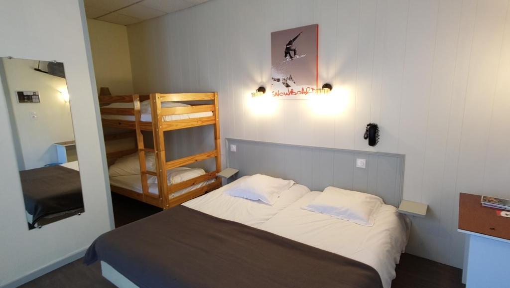 Postel nebo postele na pokoji v ubytování Hotel Le Colibri