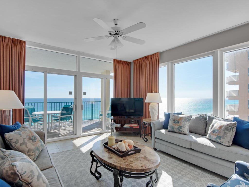a living room with a view of the ocean at Jade East Towers 1050 by Newman-Dailey in Destin