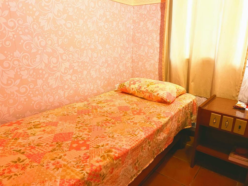 Postel nebo postele na pokoji v ubytování Toca da Mona Roots Hostel