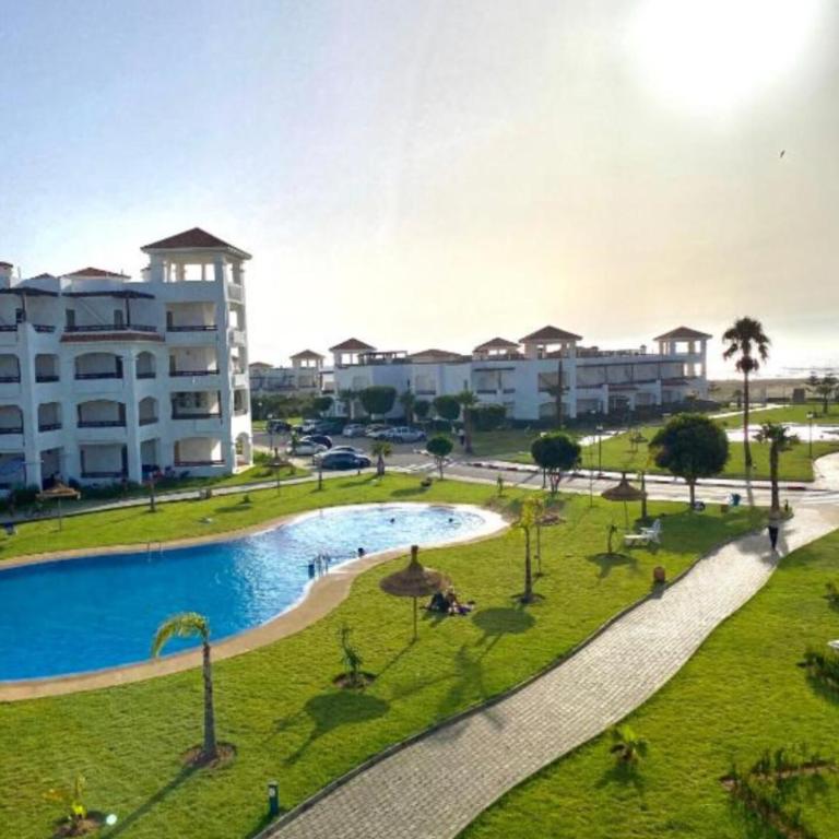 Sundlaugin á Seaside Splender appartement eða í nágrenninu