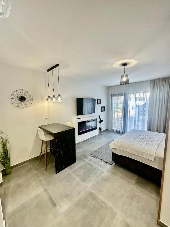 Postel nebo postele na pokoji v ubytování Apartment Sara IV