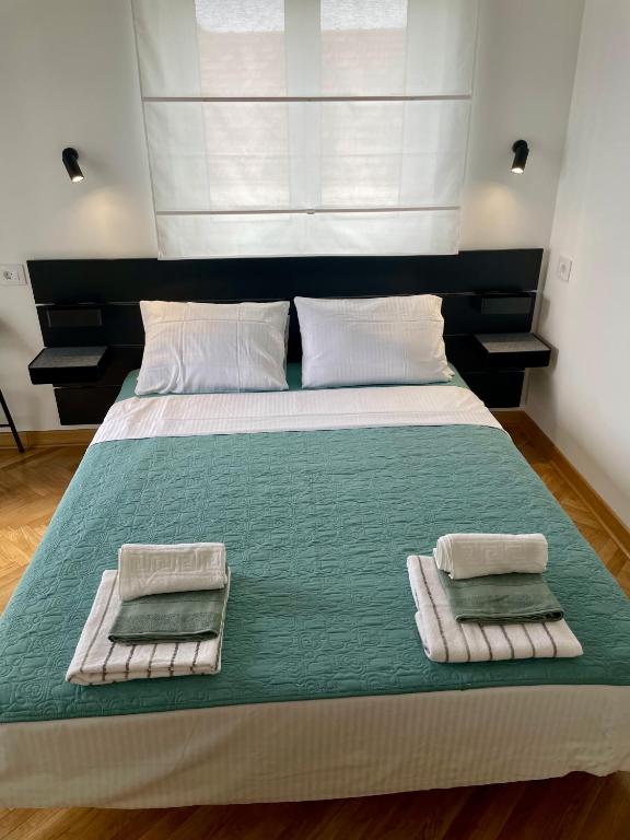Postel nebo postele na pokoji v ubytování Ancora Hotel