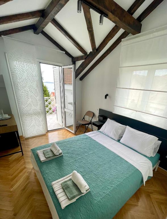Postel nebo postele na pokoji v ubytování Ancora Hotel