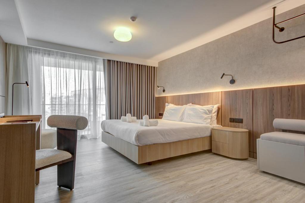 Postel nebo postele na pokoji v ubytování Noru Hotel Malta - Adults Only Hotel
