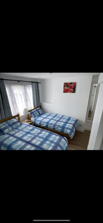 Letto o letti in una camera di The Prince Albert, Whitton