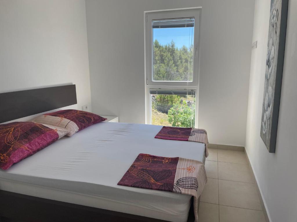 Posteľ alebo postele v izbe v ubytovaní Pearl of Kornati